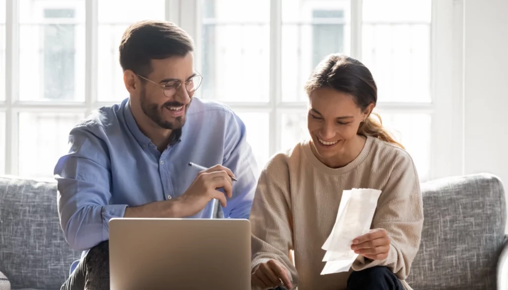 Business Man and women using a small laptop