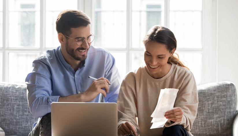 Business Man and women using a small laptop