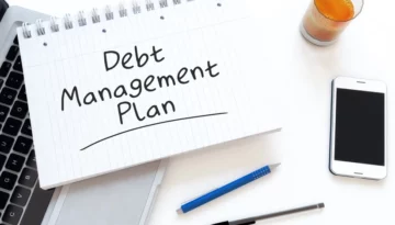 Debt Managment Plan text on a white clipbore